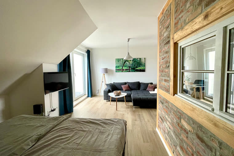 Wohn- und Schlafbereich der Ferienwohnung Spreewaldzeit 1
