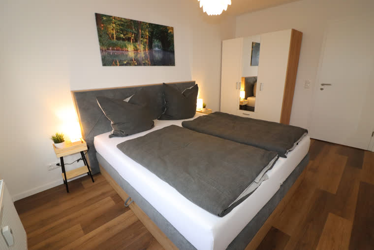 Zweites Schlafzimmer mit Doppel-Boxspringbett